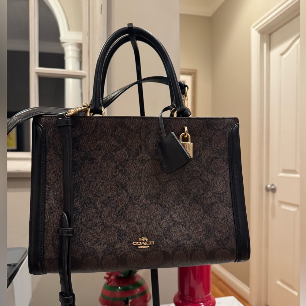 Coach - Zoe Carrycall - Black Leather and Signature Monogram Nice Condition 2019